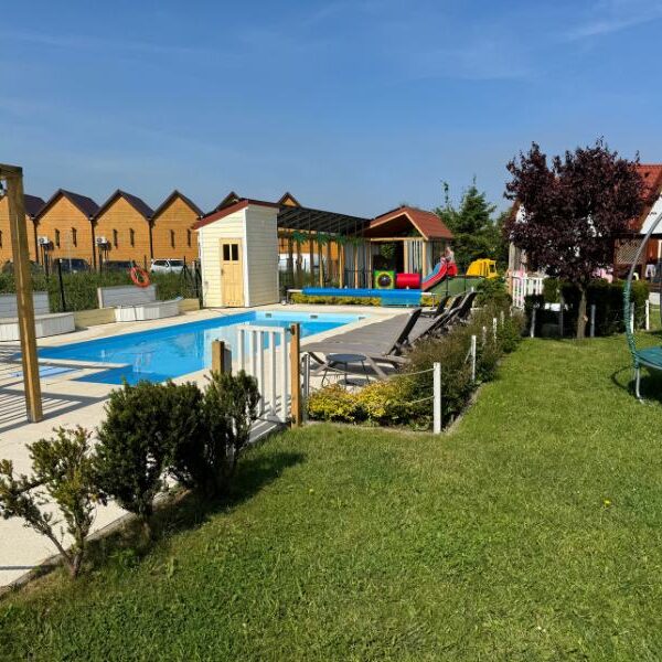 Koralia apartamenty i domki z basenem